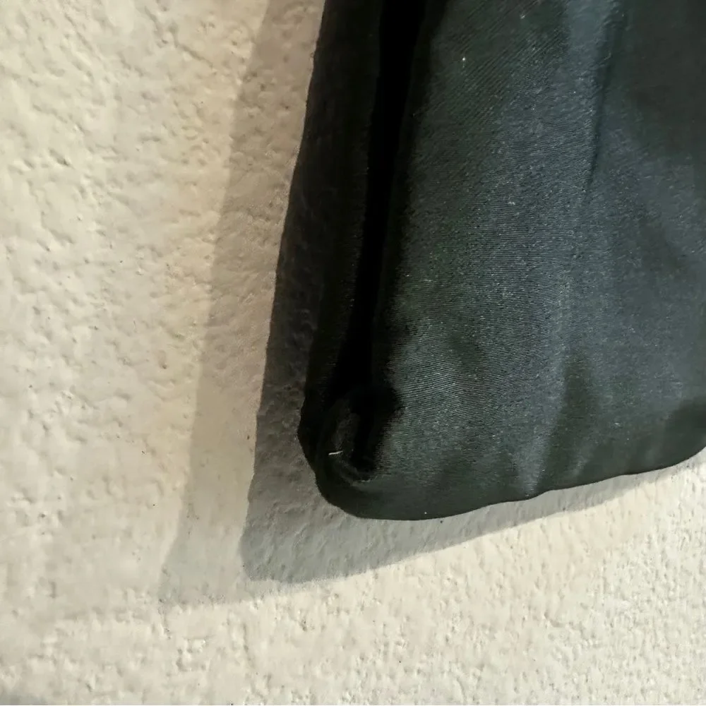 Vintage | deep green satin bag on a chain with the 1987 opera ticket